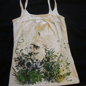 White spaghetti tank with leaves printed pattern